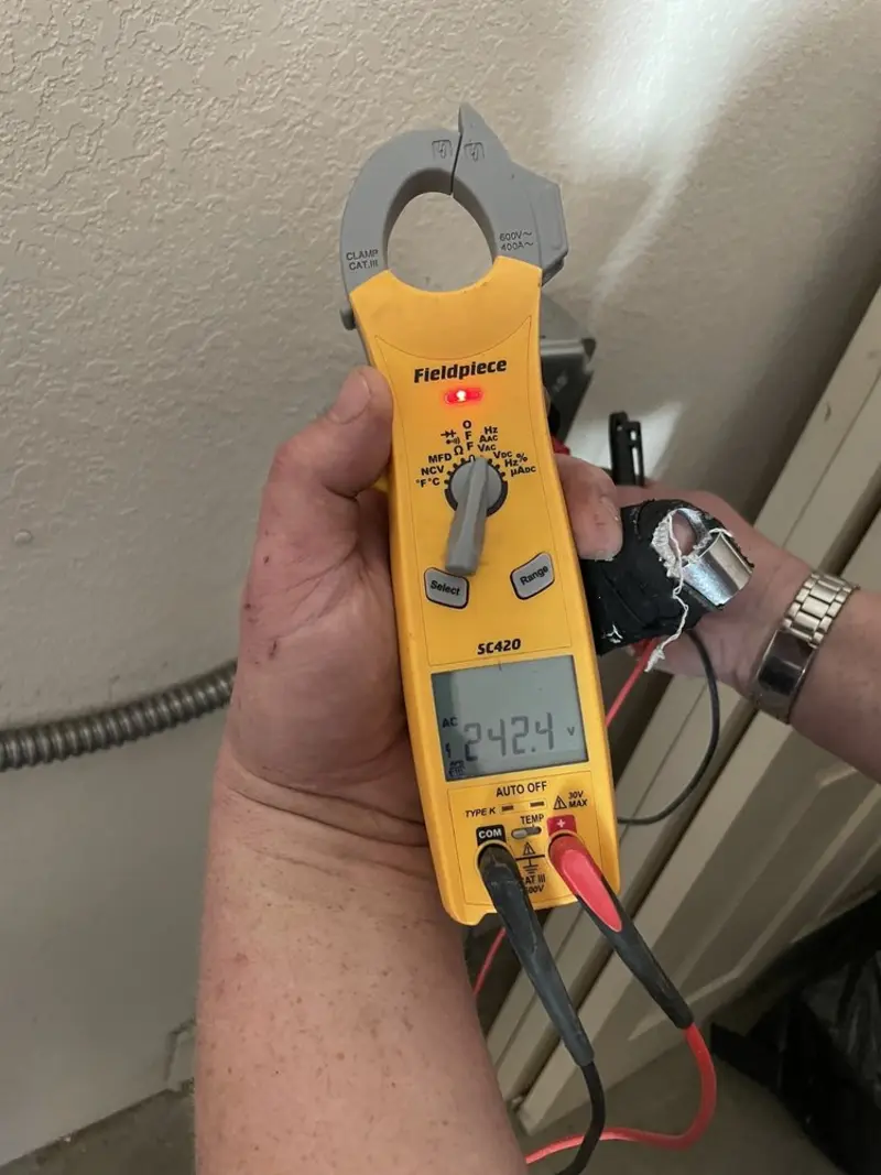 Voltage testing with clamp meter during Circuit Breaker Repair in Broadlands